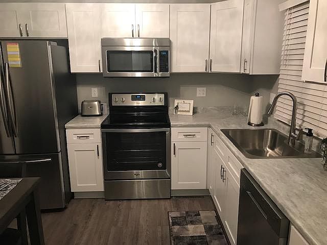 All new stainless steel appliances. Combo conventional/Convection Oven. Dishwasher. Garbage disposal, with farm sink.