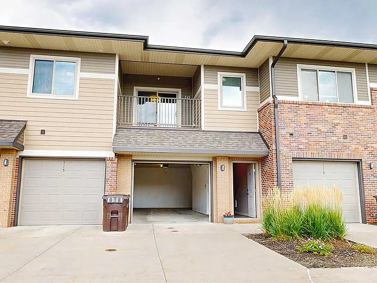 Enjoy the convenience of an attached garage, offering covered parking and extra storage space.