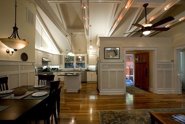 Stunning finishes include Teak Floors, Cathedral ceilings, and Cable Lighting