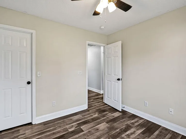 Guest bedroom #2 or office with small walk in closet.