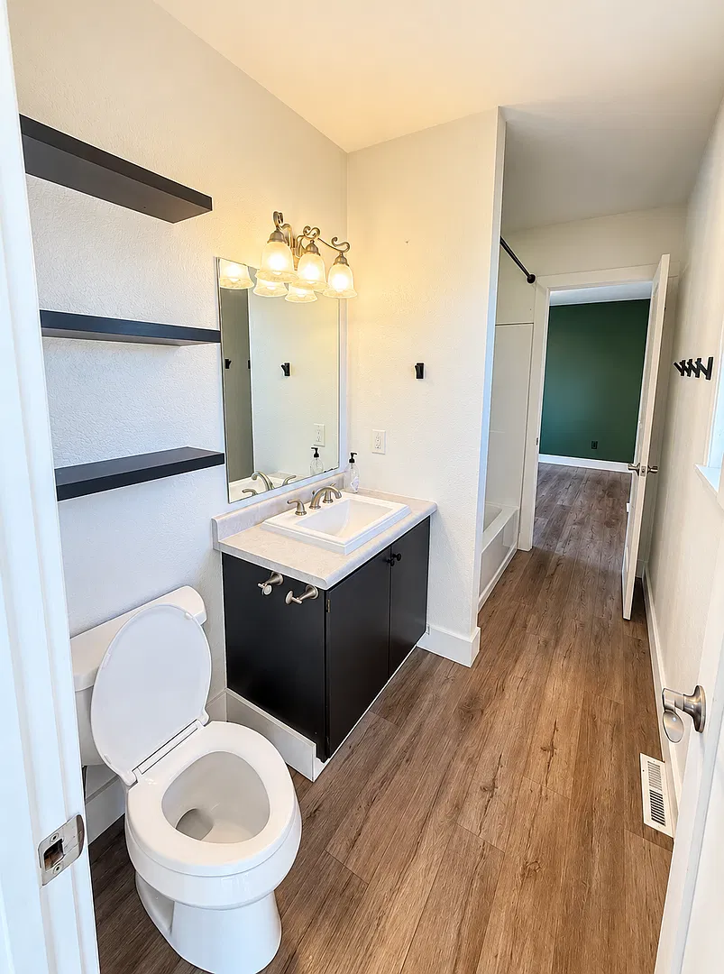 Spacious 3-Bedroom Home with Updated Kitchen, 2-Car Garage & Large Fenced Yard! — Photo 4