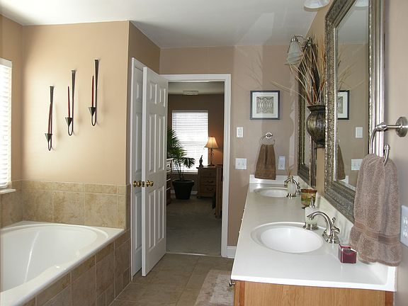 Master Bath complete with tiled shower and oversized soaking tub