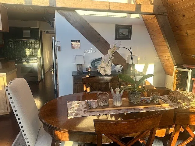 Cozy dining area allows light to pour over you throughout the day