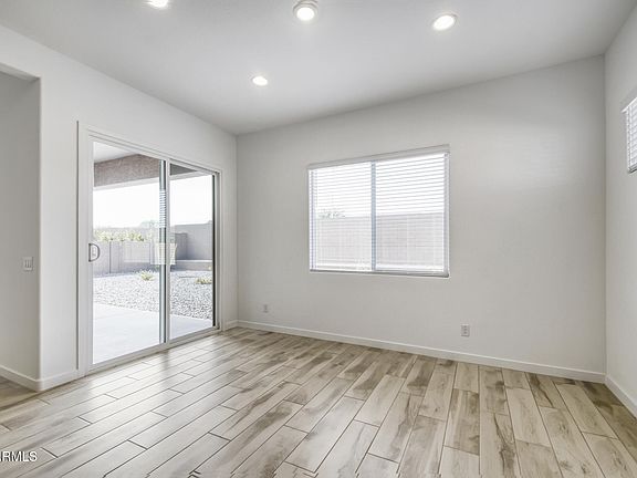 5th image of 7942 W ROWEL Road