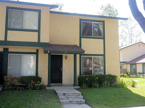 Front of townhouse. End Unit with lots of shade!