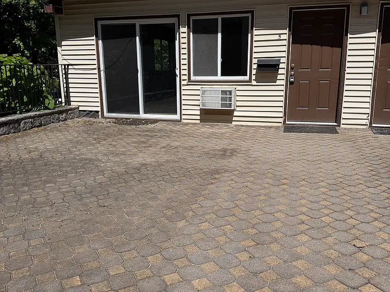 Private entry and front porch with sliding glass door