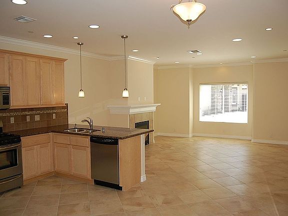 Kitchen area open to living/family room. 