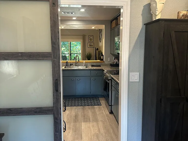 sliding barn door for privacy for office/bonus room