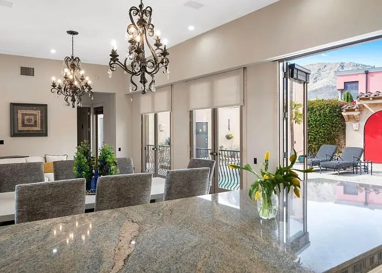Six double magnificent doors that open side-by-side to bring the outside in.
