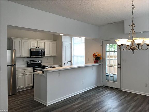 KITCHEN-OPEN TO DINING & LIVING AREA