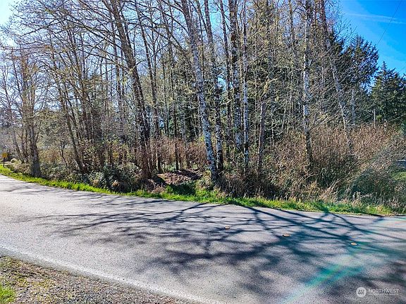View of the lot for sale - Bay views shown are behind the photographer>