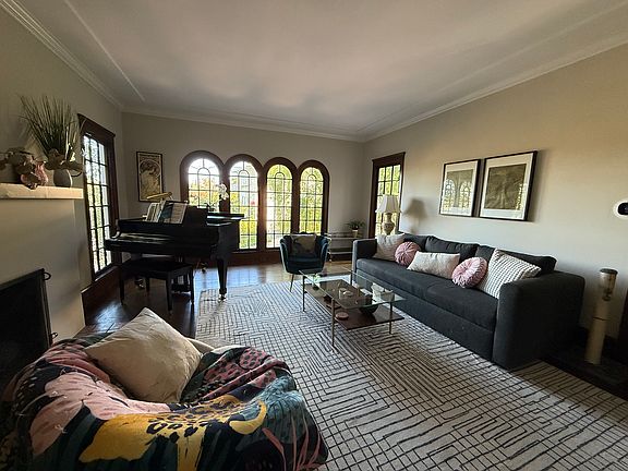 Living room with fireplace w/ gas insert