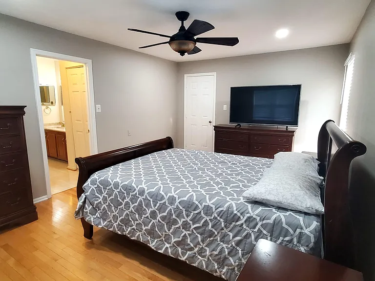 Master room with walking closet and full bathroom with tub and shower