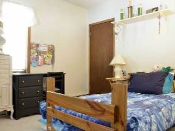 Third bedroom (12x10) located just off the living room on the main level.