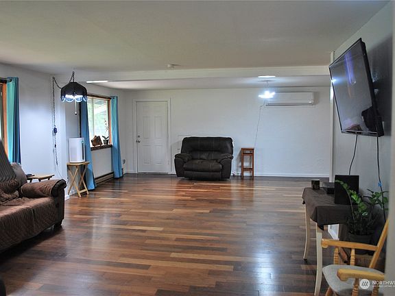 Large living and dining rooms.>