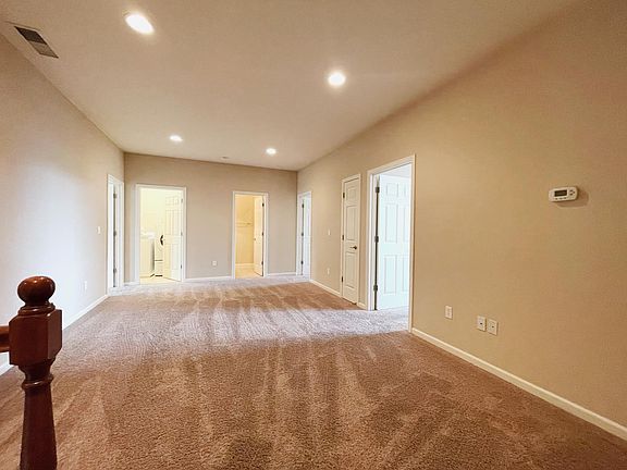 Large upstairs loft leading to bedrooms