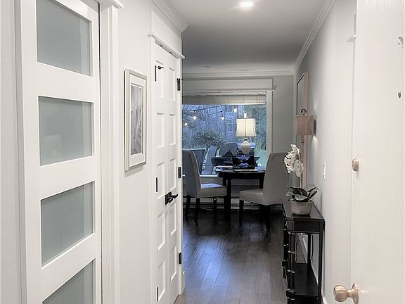 High-end doors with frosted glass are on either side of the kitchen - can be closed off and still reflect all possible light!