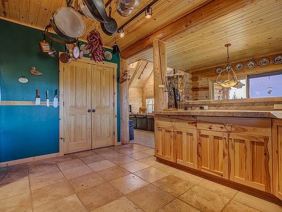Kitchen has large pantry