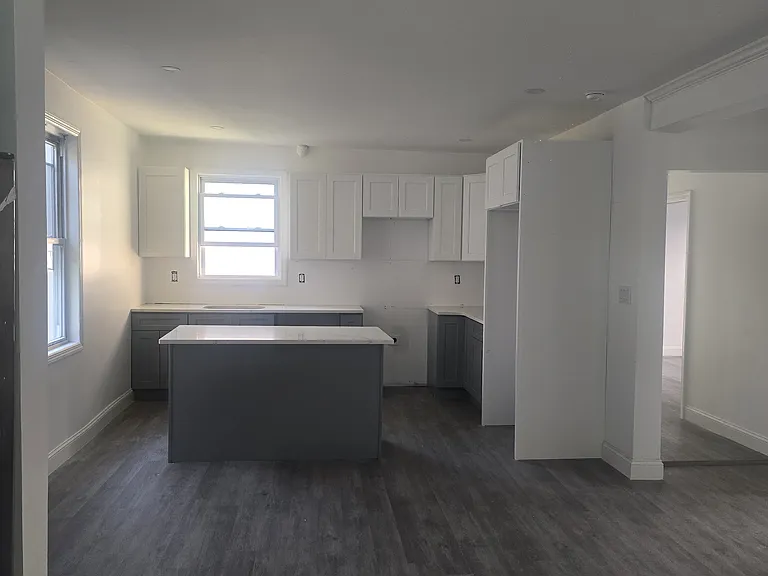 Renovated kitchen with kitchen island and stainless steel appliances including: fridge, stove, microwave and dishwasher.
**Appliances will be in the apartment before move in date.