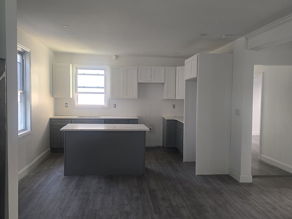 Renovated kitchen with kitchen island and stainless steel appliances including: fridge, stove, microwave and dishwasher. 
**Appliances will be in the apartment before move in date.