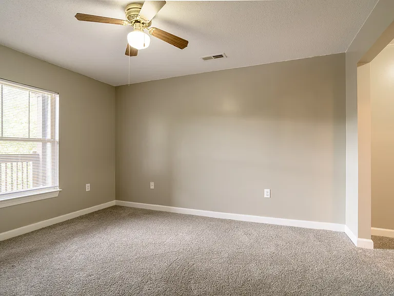 Flexible second bedroom or home office space, filled with natural light and ready to adapt to your lifestyle.