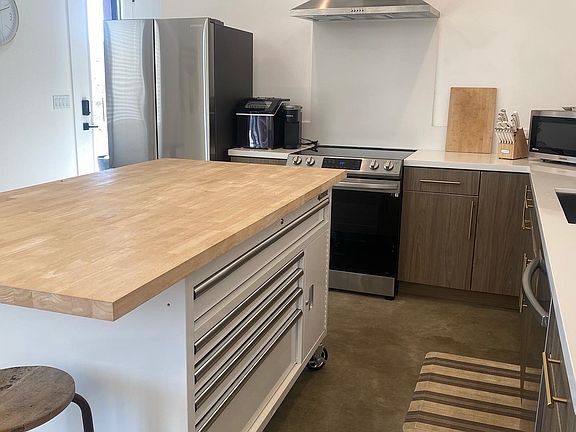 Full size refrigerator plus oven/cooktop/dishwasher/microwave and kitchen appliances/tools