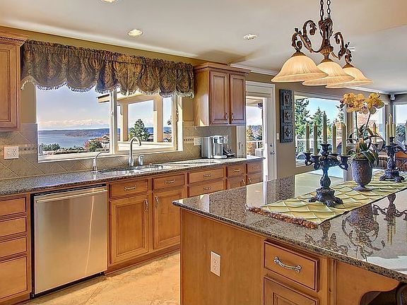 Quality features of this magnificent kitchen include, a 8ft x 4 ft center isla