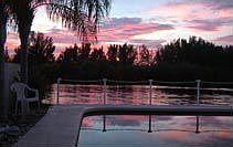 beautiful sunset views over pool and down canal