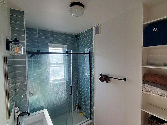 Newly renovated bathroom with walk-in shower