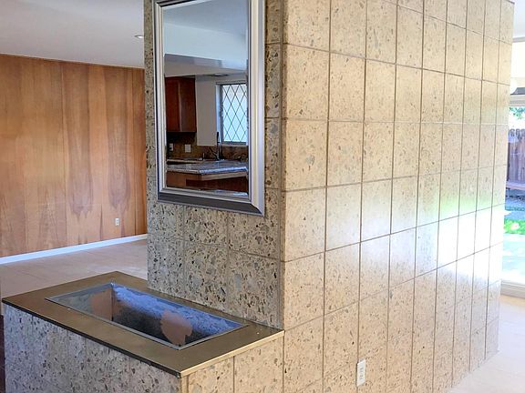Planter & Terrazzo wall off entry