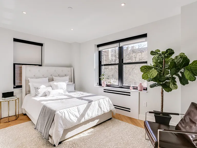 Sun filled one bedroom apartment with hardwood floors and custom closets