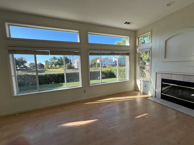 Family room with fireplace and beautiful water views