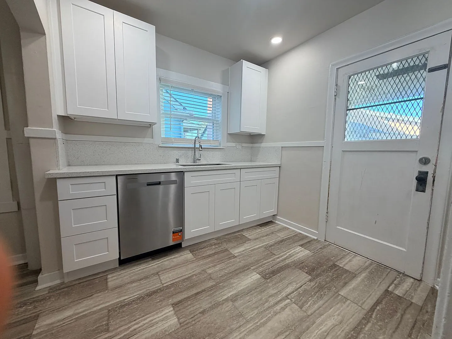 Updated Central District Home | Remodeled Kitchen + Flexible Bonus & Hobby Space — Photo 3