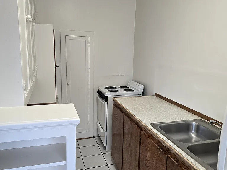 The Travis Apartments — Photo 26