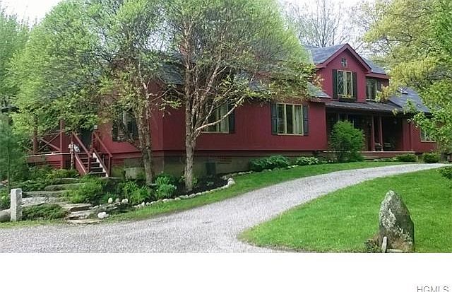 Incredible Post & Beam home, 6.8 acres, fenced for horses, detached 3 car garage, outbuidlings & privacy.