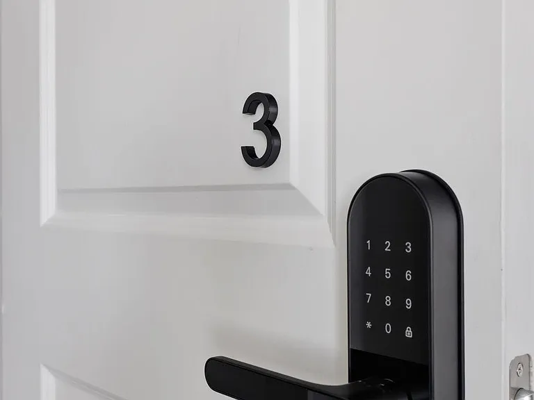 Private room entry with numbered door and keyless keypad lock for convenient, secure access.