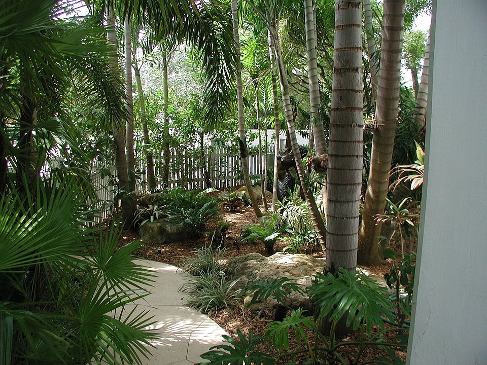 Yard with bronze mermaid