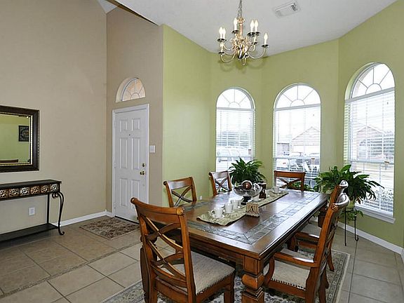High Ceilings through out house with 2 Story entryway and Living room.