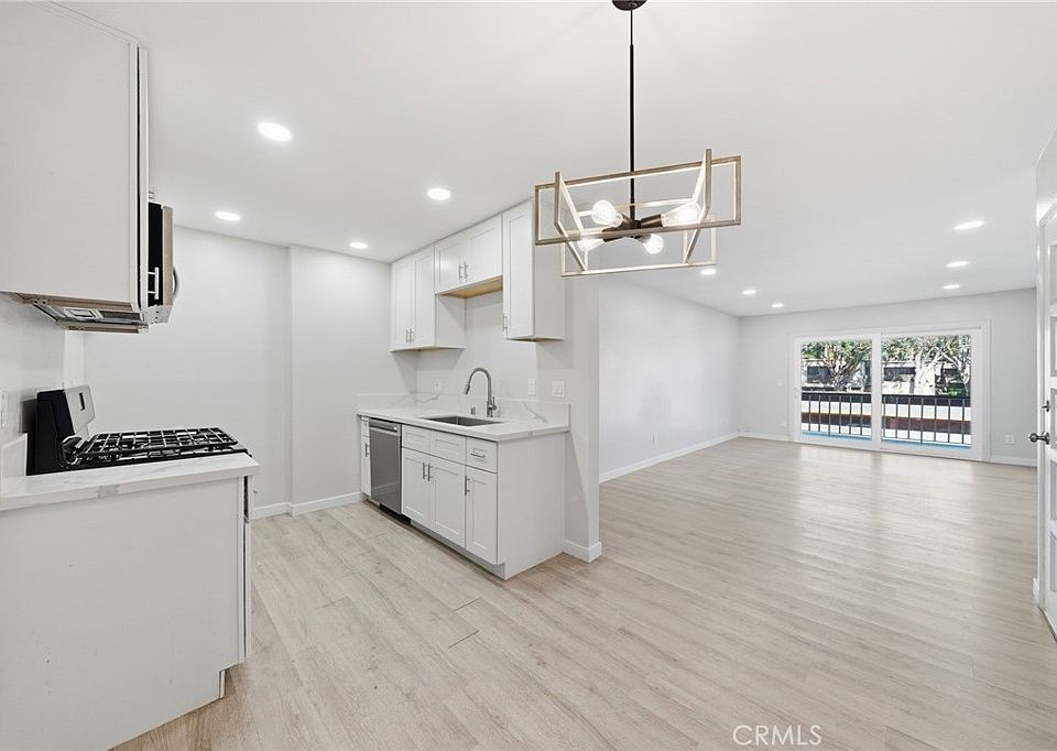 1st image of 6600 Warner Ave Unit 205