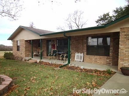Front of House
						:
						Large front yard with full circle drive and mature trees offering lots of shade
