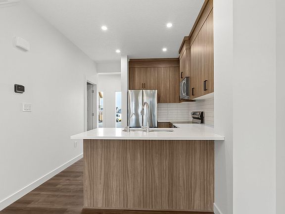 4th image of 8710 Edgemont Way NW