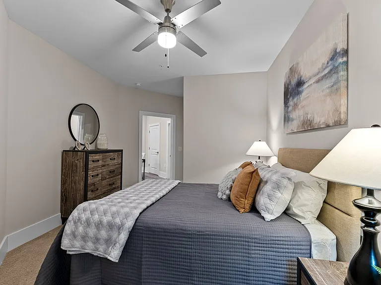 Active Adult bedroom with ceiling fan