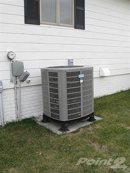 410E4thSpencerHeatPumpinBack