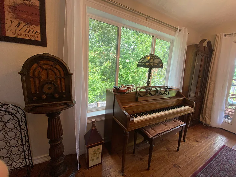 Piano with Forest Views and China Cabinet