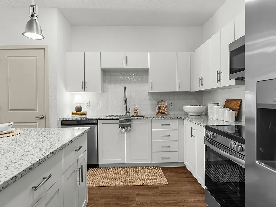 Experience the elegance and functionality of this modern kitchen design.