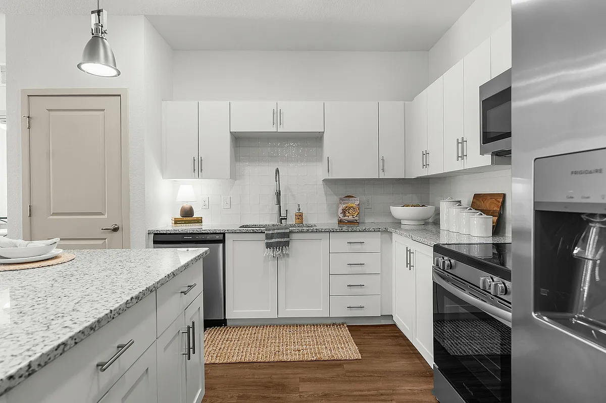 Experience the elegance and functionality of this modern kitchen design. - Livano Nature Coast