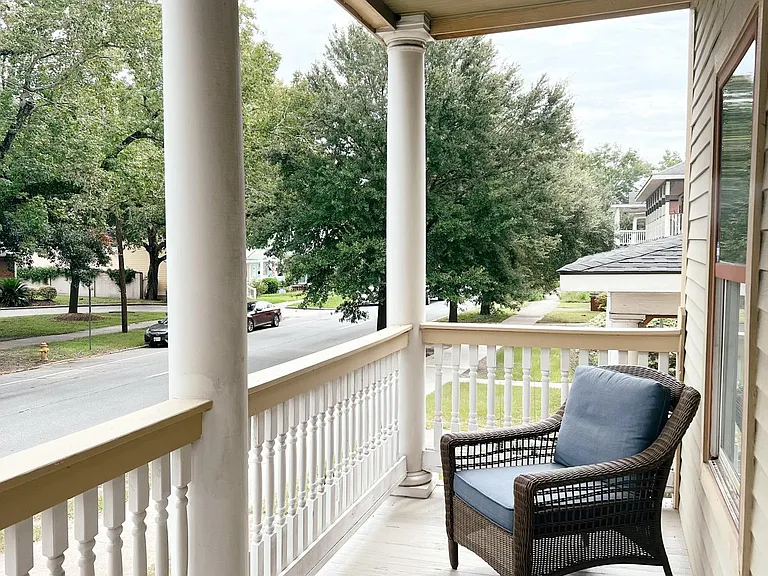 Comfortable front porch with seating, perfect for morning coffee or evenings outside.
