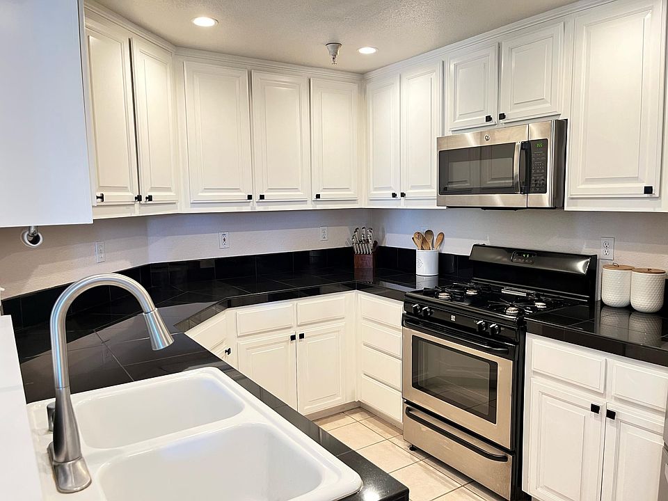 Kitchen (stainless steel French door fridge included, not pictured)