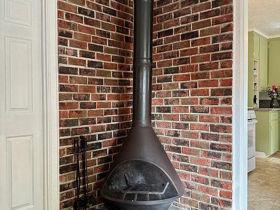 Cast Iron fire place from living room view.
