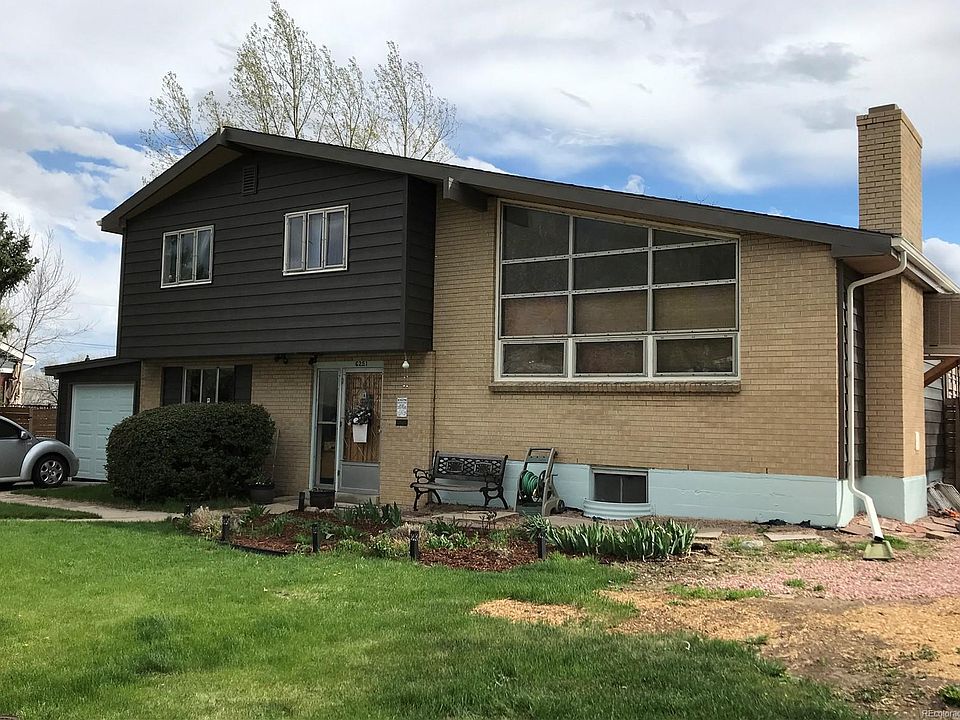 Front of House with beautiful landscaping!